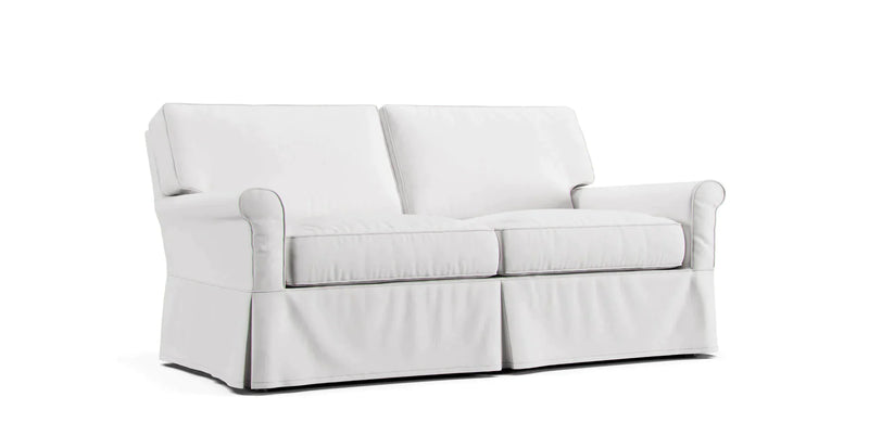 Crate and Barrel Bayside loveseat featuring white Cotton Canvas slipcover