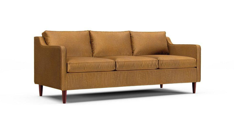 A West Elm Hamilton eighty inch sofa in a Signature Velvet Caramel cover