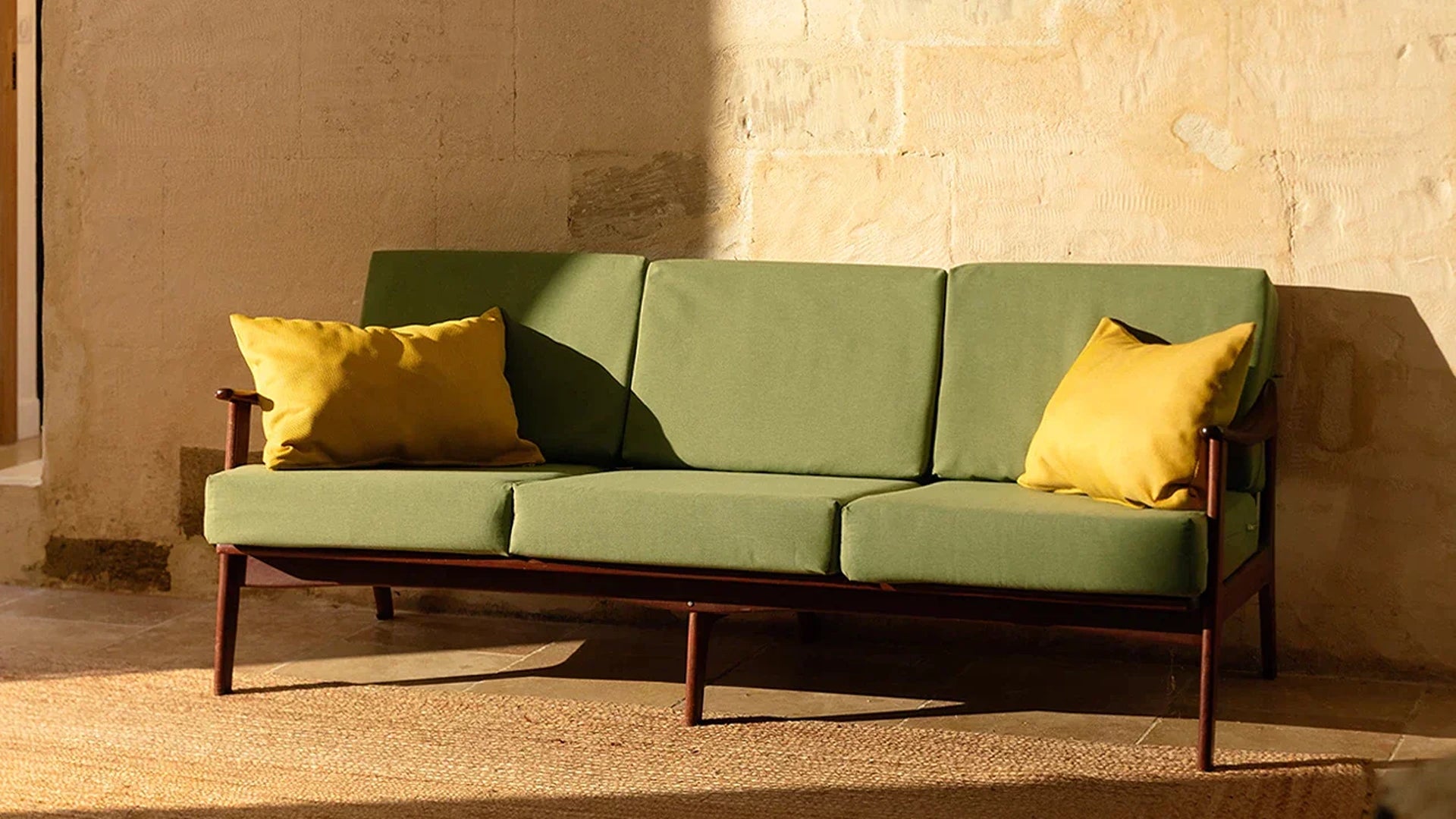 An IKEA Liliberg 3 seater sofa with a UV-resistant and spill-resistant Performance Canvas Sage slipcover in a living space