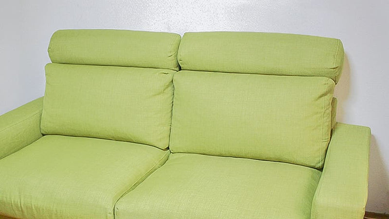 MUJI sofa headrest featuring green Textured Weave cover