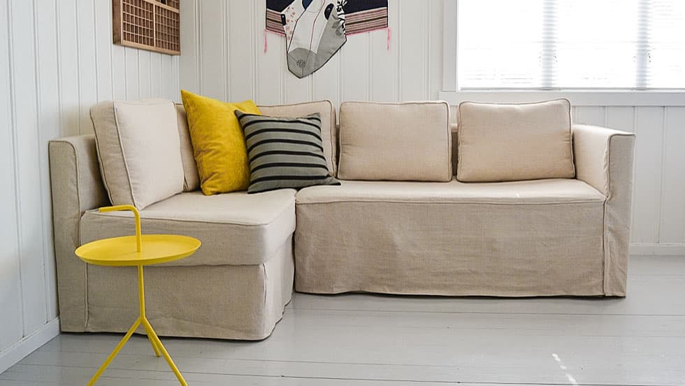 IKEA Fagelbo chaise sofa in a natural Pure Linen cover with skirt, in a basic living room