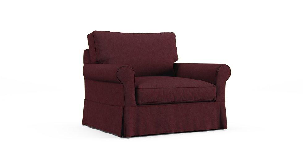 An Arhaus Baldwin Slipcovered Chair in an Everyday Weave Maroon cover