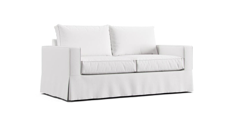 Arhaus Filmore sofa featuring white Cotton Canvas slipcover