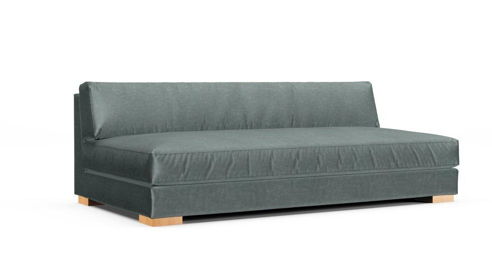 A CB2 Piazza sofa in a Signature Velvet Eucalyptus cover