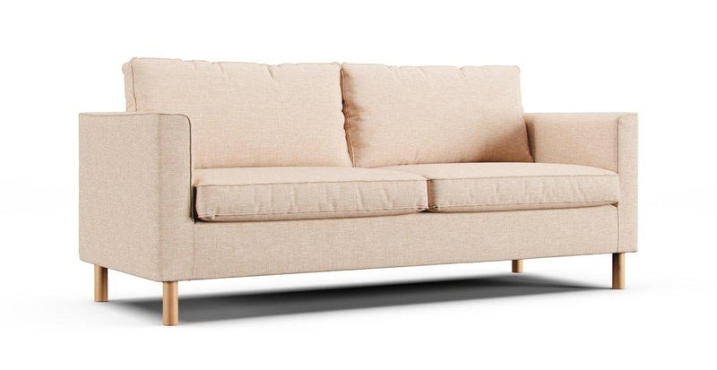 A IKEA Parup sofa in a sand Cotton Canvas cover on a white background