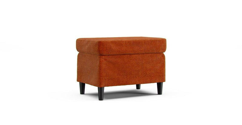 An IKEA Strandmon footstool in a Comfort Chenille Burnt Orange cover