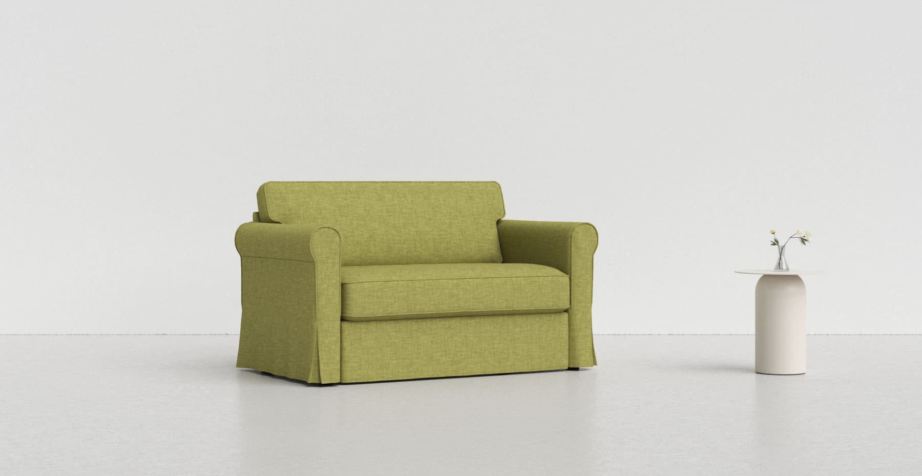 A lime green Hagalund sofa on a lighter grey background with a white vase beside it