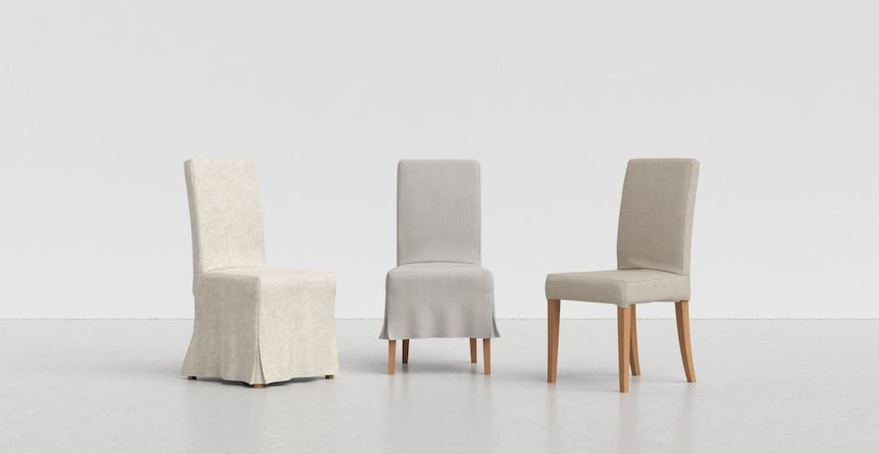 A collection of IKEA Harry dining chairs in covers of varying lengths and shades of neutral and cream