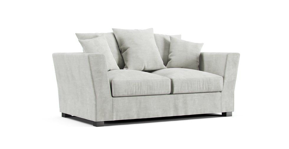 A Maisons du Monde Balthazar sofa in an ash grey Classic Velvet cover on a white background