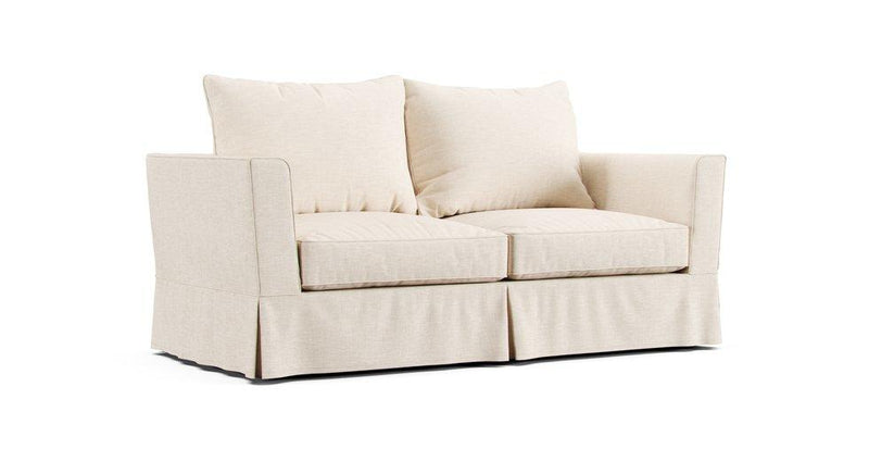 A Maisons du Monde Royan sofa in a cream Textured Weave cover on a white background
