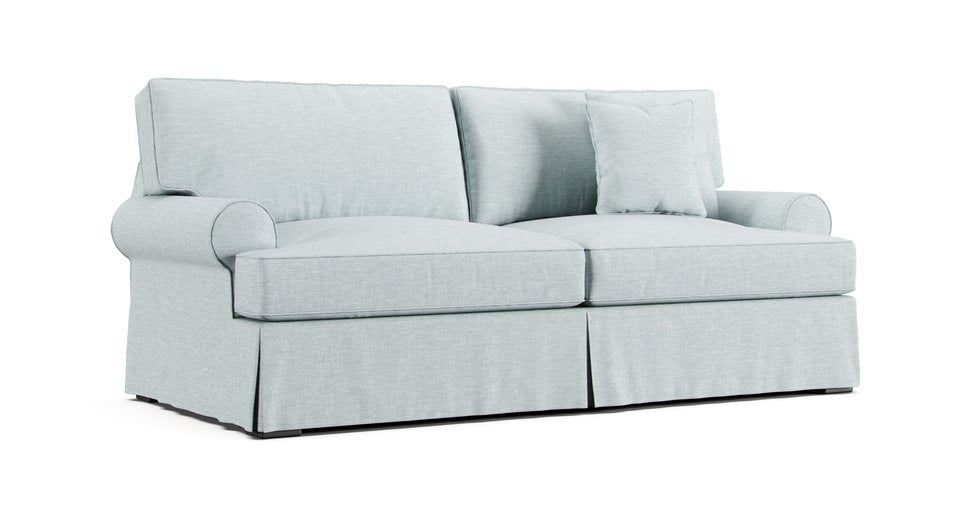 Mitchell Gold and Bob Williams Nicki sofa in a light grey-toned frost Textured Weave cover on a white background