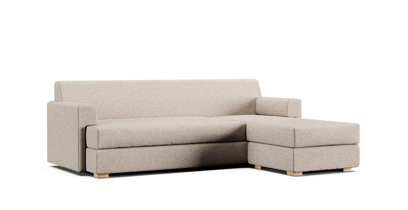 A Muji Sectional Sofa (2009) in an Eco Basketweave Oatmeal cover