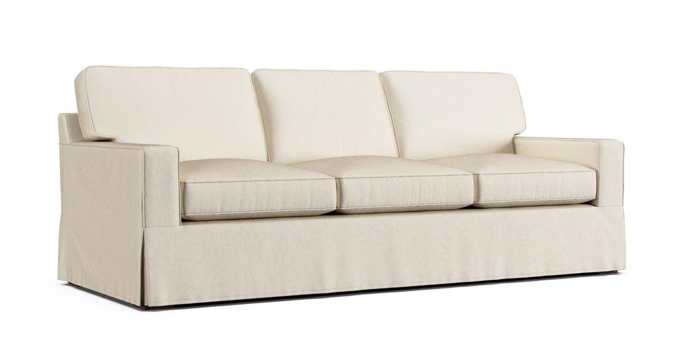 A Pottery Barn Buchanan Square Arm Sleeper Sofa in a Cotton Canvas Sand cover