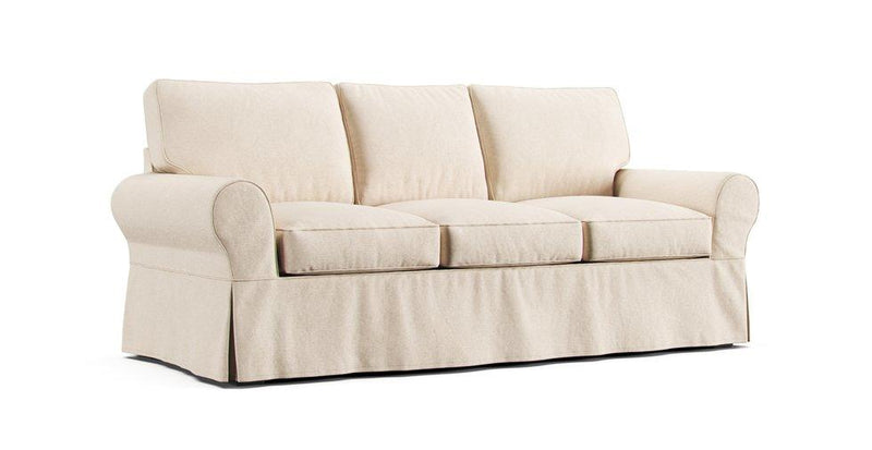 A Pottery Barn Basic Sleeper sofa in a Pure Linen Natural cover