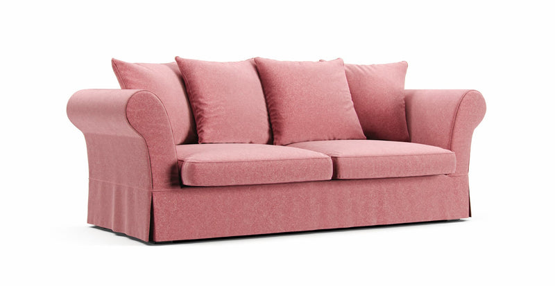 A Maisons du Monde Roma sofa in a rose pink Claw-proof Velvet cover on a white background