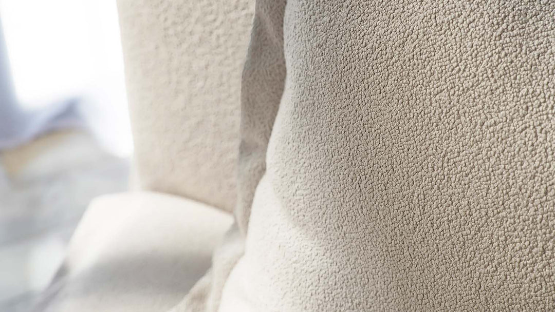 Beauty-closeup-shot-of-IKEA-Soderham-single-seater-sofa-covered-in-ModBoucle-in-Oatmeal-colour
