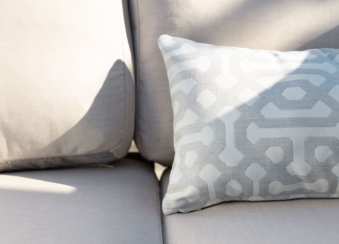 Close-up of an outdoor sofa couch cushion in Sunbrella Canvas Flax slipcover
