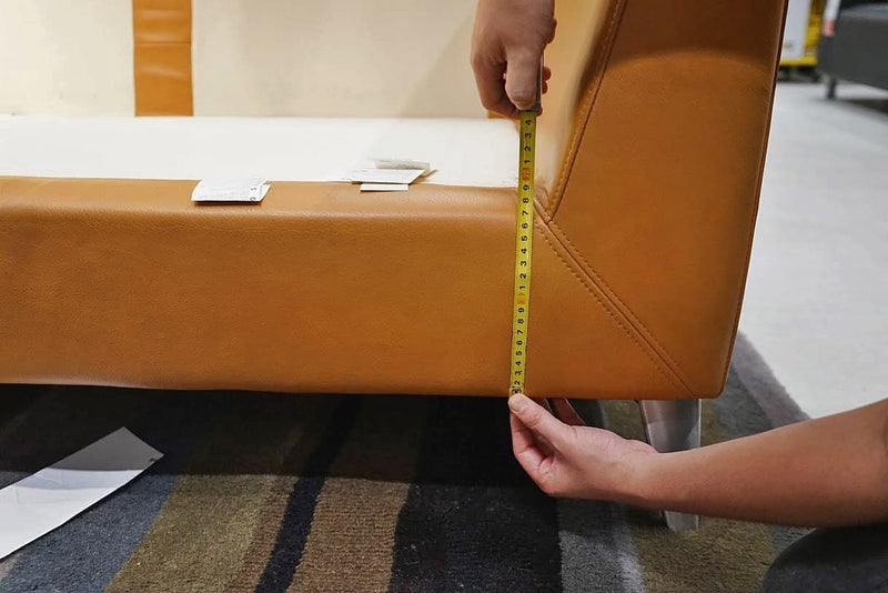 Measurement guide of a sofa seating base height