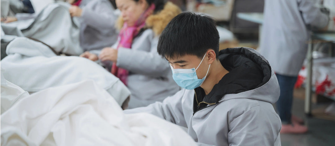 Comfort-Works-inhouse-cutter-inspects-fabrics-for-sofa-covers-in-factory