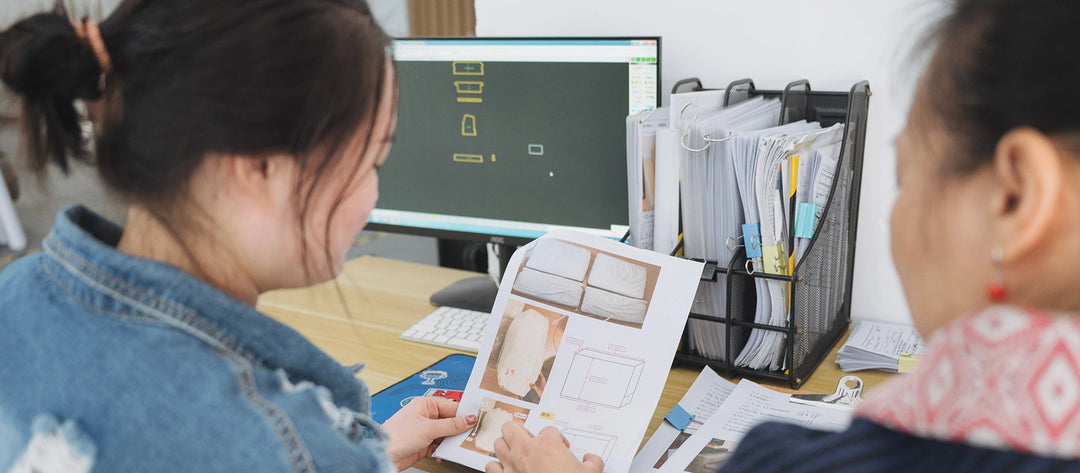 Comfort-Works-reviewing-customer-couch-measurements-for-custom-couch-cover-pattern-making-in-factory