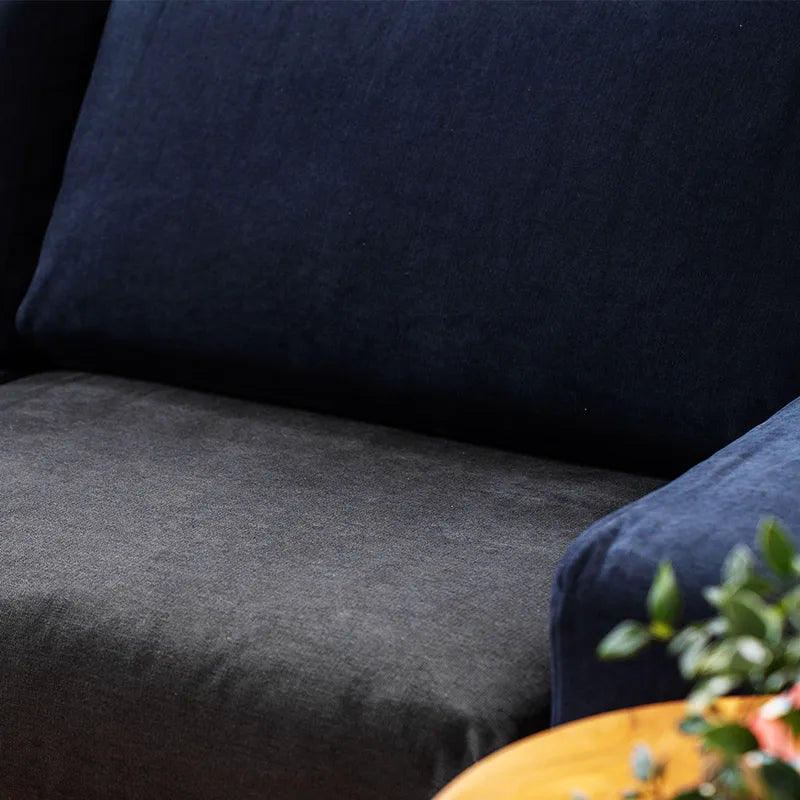 Closeup-of-ComfortWorks-FlexiFit-universal-couch-cushion-cover-in-Storm-colour-on-IKEA-KOARP-sofa