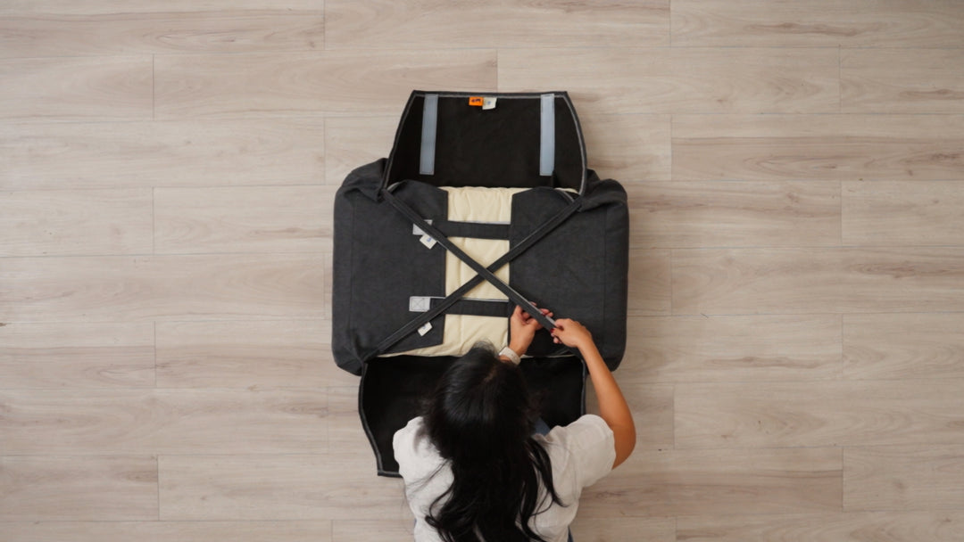 Quick-easy-guide-to-transform-your-sofa-with-ComfortWorks-universal-couch-cushion-cover-FlexiFit-step-2-secure-cross-straps-to-anchor-corners