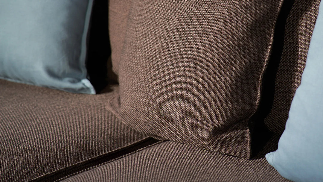Closeup-of-a-sofa-seat-and-pillows-ComfortWorks-Mod-Basketweave-couch-cover-in-Espresso