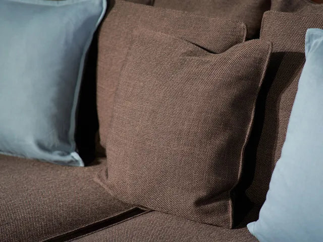 Closeup-of-a-sofa-seat-and-pillows-ComfortWorks-Mod-Basketweave-couch-cover-in-Espresso