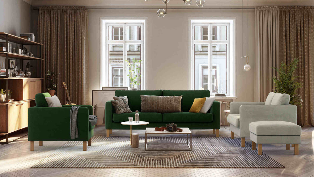 Scandinavian living room with IKEA Karlstad sofa in Classic Velvet Forest Green and Performance Weave Stone slipcover