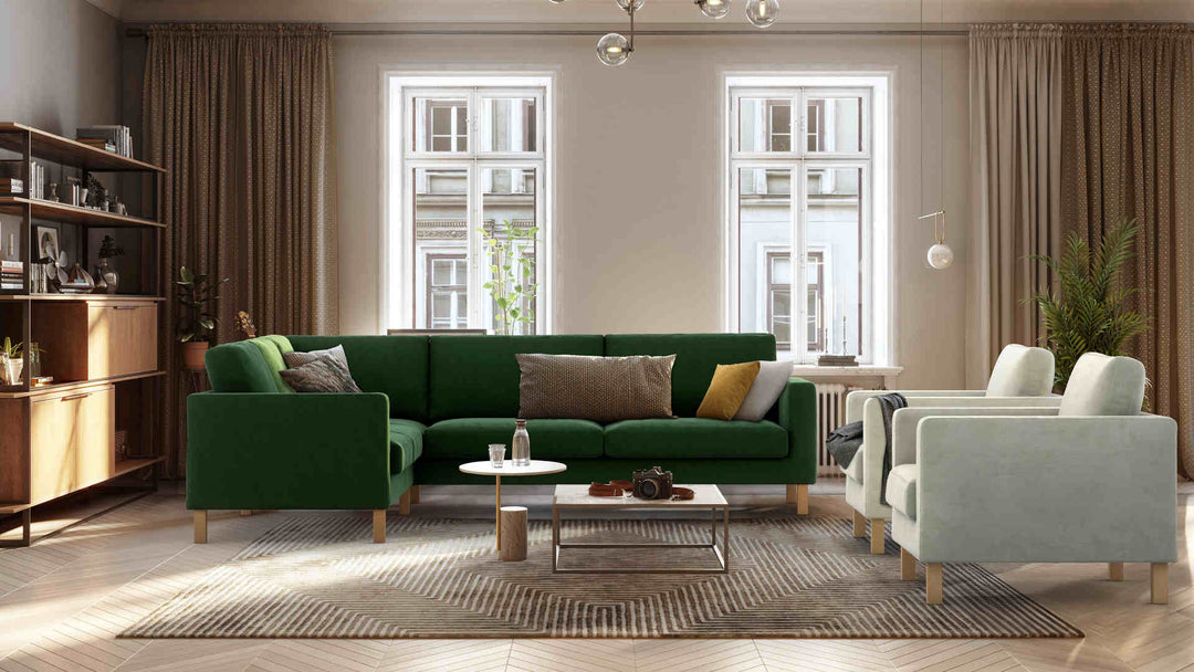 Scandinavian living room with IKEA Karlstad sofa in Classic Velvet Forest Green and Performance Weave Stone slipcover
