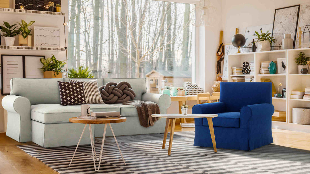 Bohemian living room with IKEA Ektorp sofa in Performance Weave Stone and Classic Velvet Cobalt slipcover