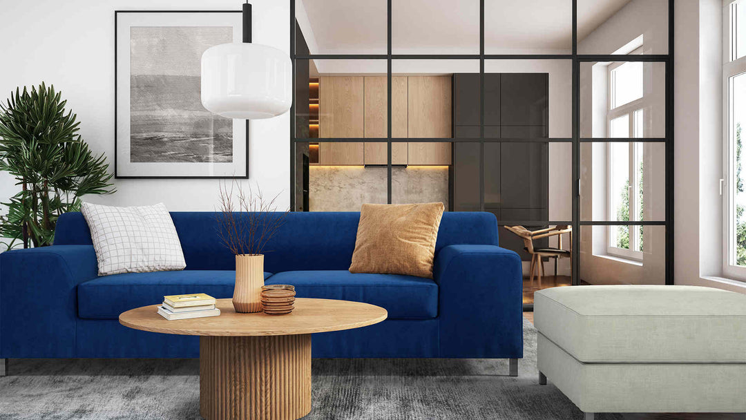 Modern living room with IKEA Kramfors sofa in Classic Velvet Cobalt and Performance Weave Stone slipcover