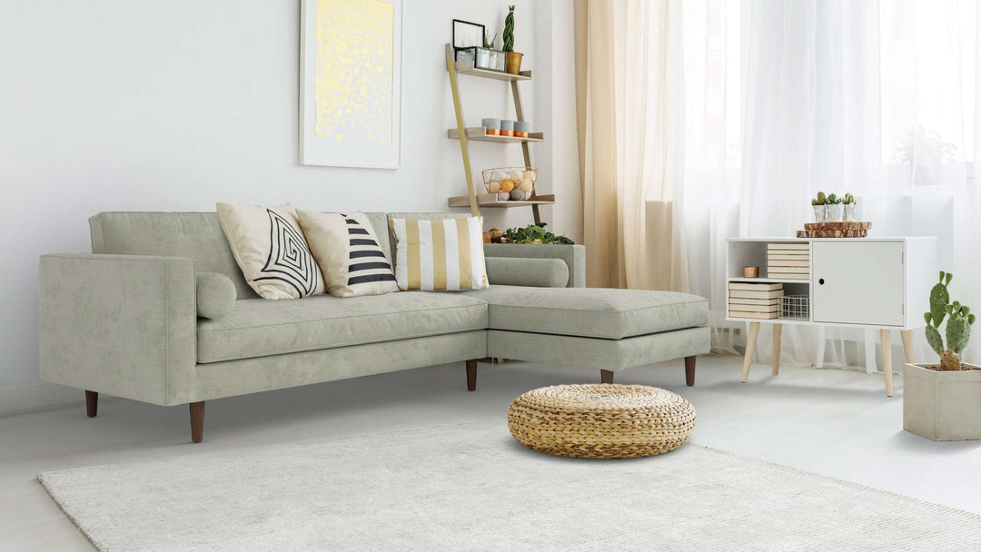 Bohemian living room with Article Sven sofa in Performance Weave Stone fabric slipcover