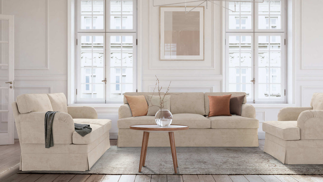 Modern Victorian living room with IKEA Stocksund sofa in Performance Weave Cream and Comfort Chenille Burnt Orange slipcover