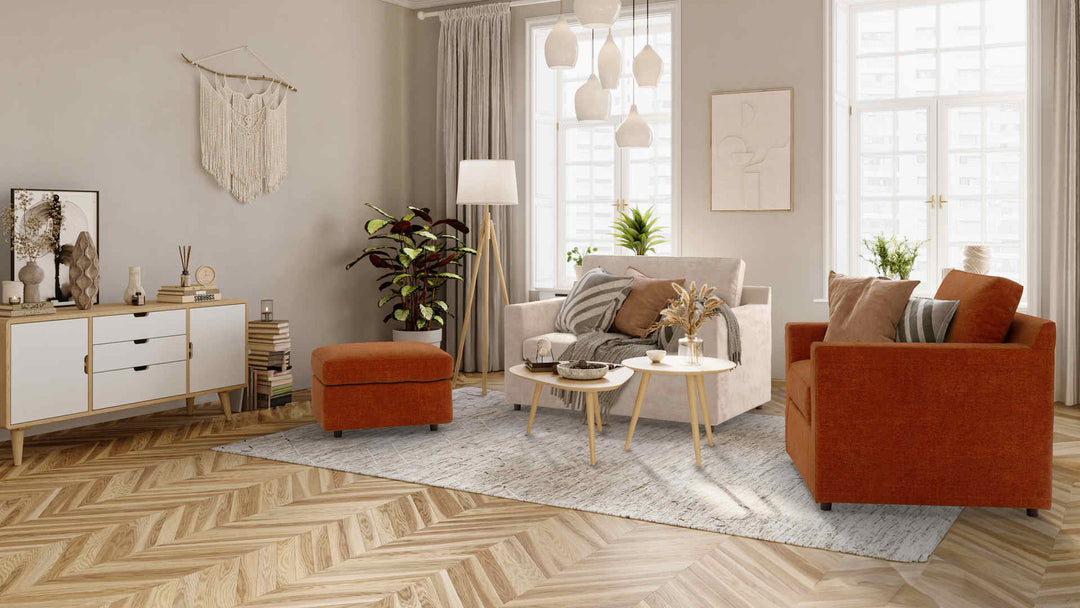 Scandinavian living room with Crate and Barrel Barrett sofa in Performance Weave Cream and Comfort Chenille Burnt Orange slipcover