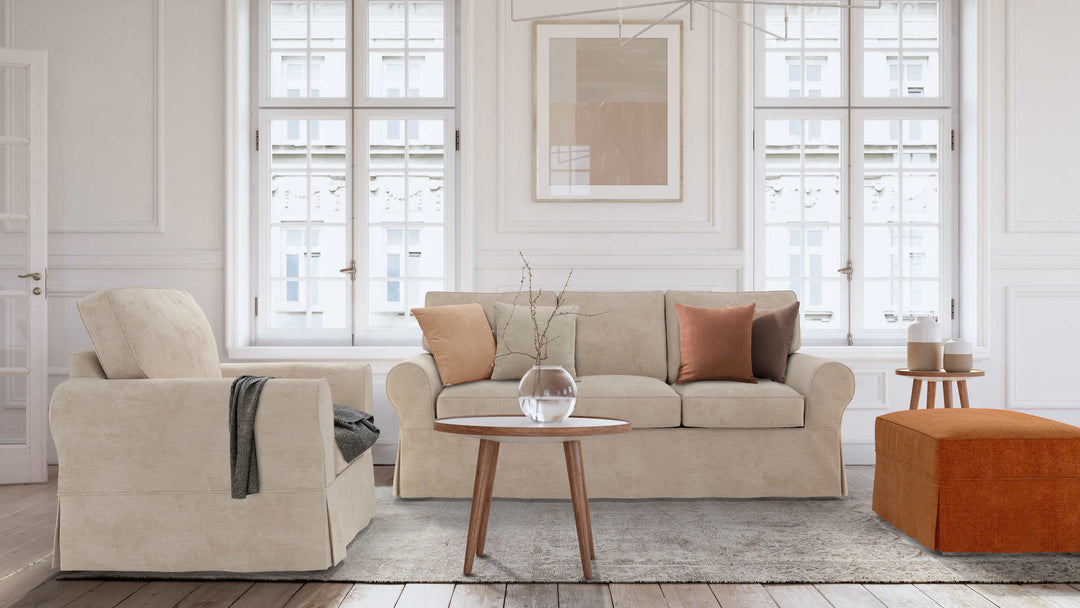 Modern Victorian living room with Pottery Barn PB Basic sofa in Performance Weave Cream and Comfort Chenille Burnt Orange slipcover
