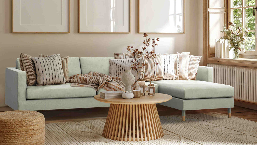 Nordic Minimalist living room with Pottery Barn PB Basic sofa in Performance Weave Stone slipcover