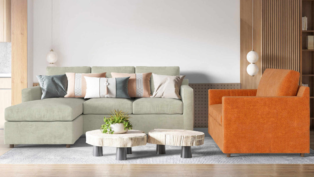 Modern living room with Crate and Barrel Barrett sofa in Performance Weave Stone and Comfort Chenille Burnt Orange slipcover