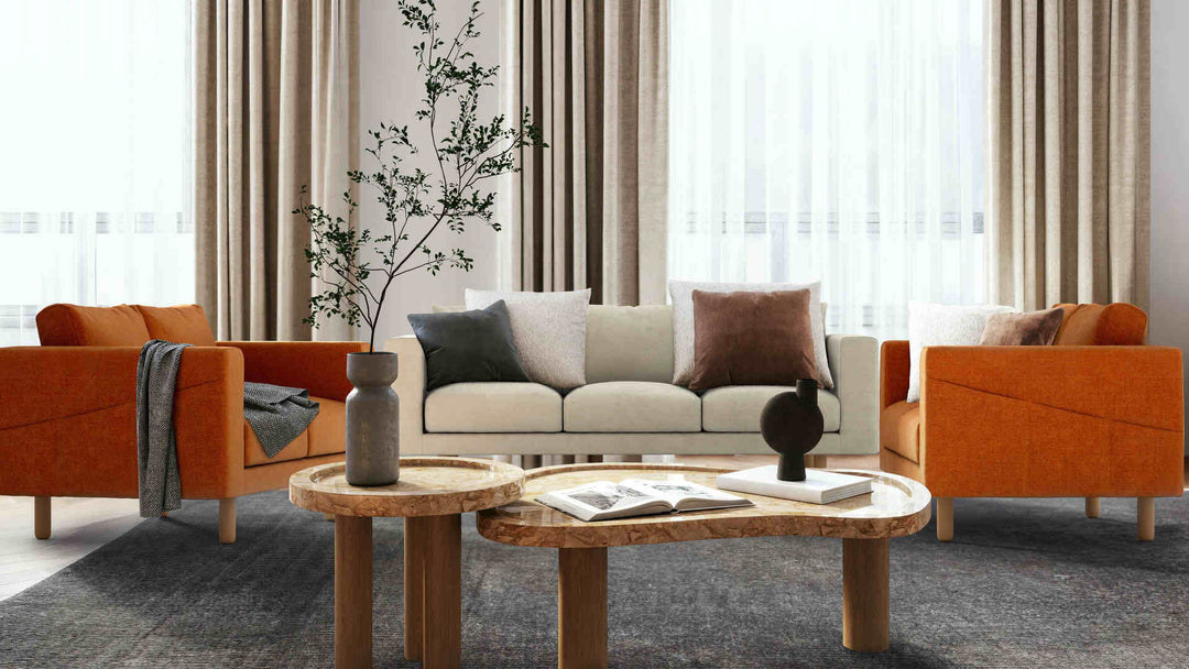 Modern living room with IKEA Norsborg sofa in Performance Weave Stone and Comfort Chenille Burnt Orange slipcover