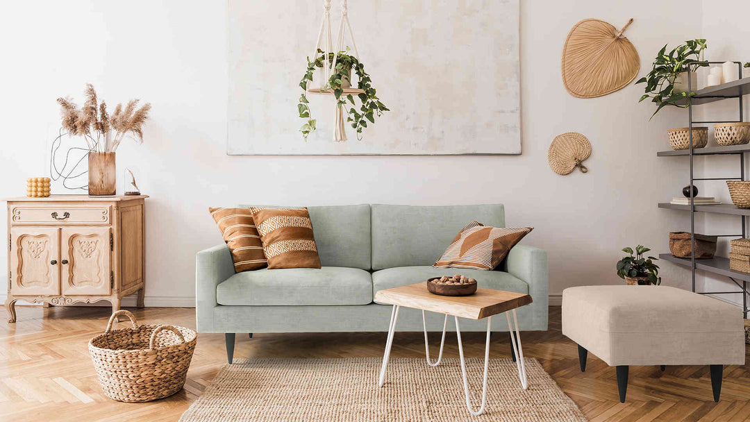 Scandinavian living room with Crate and Barrel Petrie Midcentury sofa in Performance Weave Stone and Performance Weave Cream slipcover