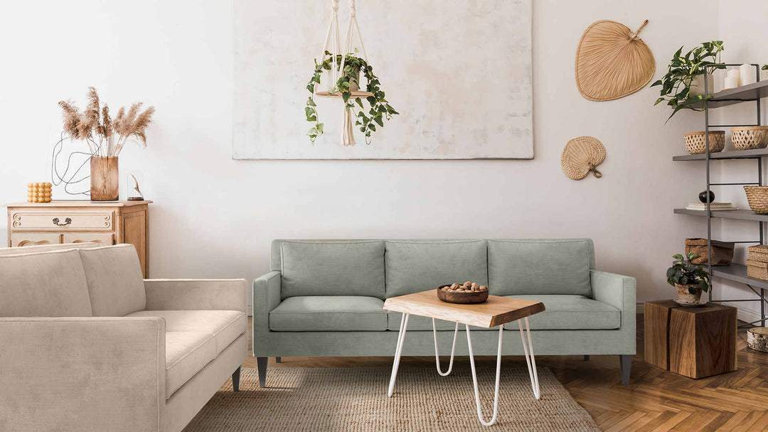 Scandinavian living room with Crate and Barrel Rochelle Midcentury sofa in Performance Weave Stone and Performance Weave Cream slipcover