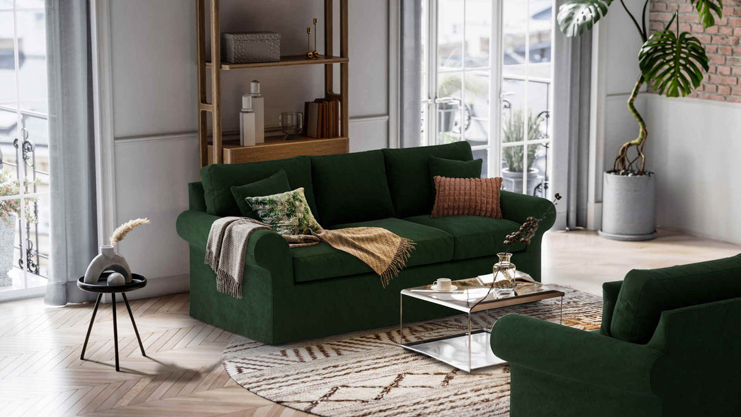 Nordic Minimalist living room with Ethan Allen Bennett Roll-Arm sofa in Classic Velvet Forest Green slipcover