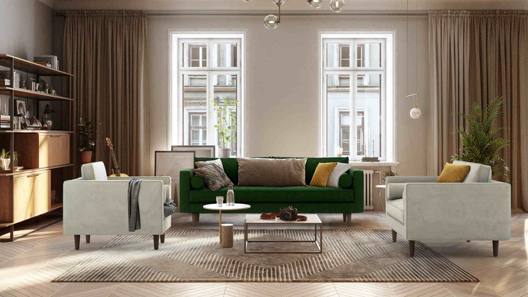 Scandinavian living room with Article Sven sofa in Classic Velvet Forest Green and Performance Weave Stone slipcover