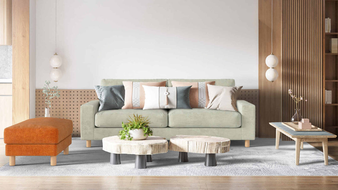 Modern living room with Muji Wide Arm sofa in Performance Weave Stone and Comfort Chenille Burnt Orange slipcover