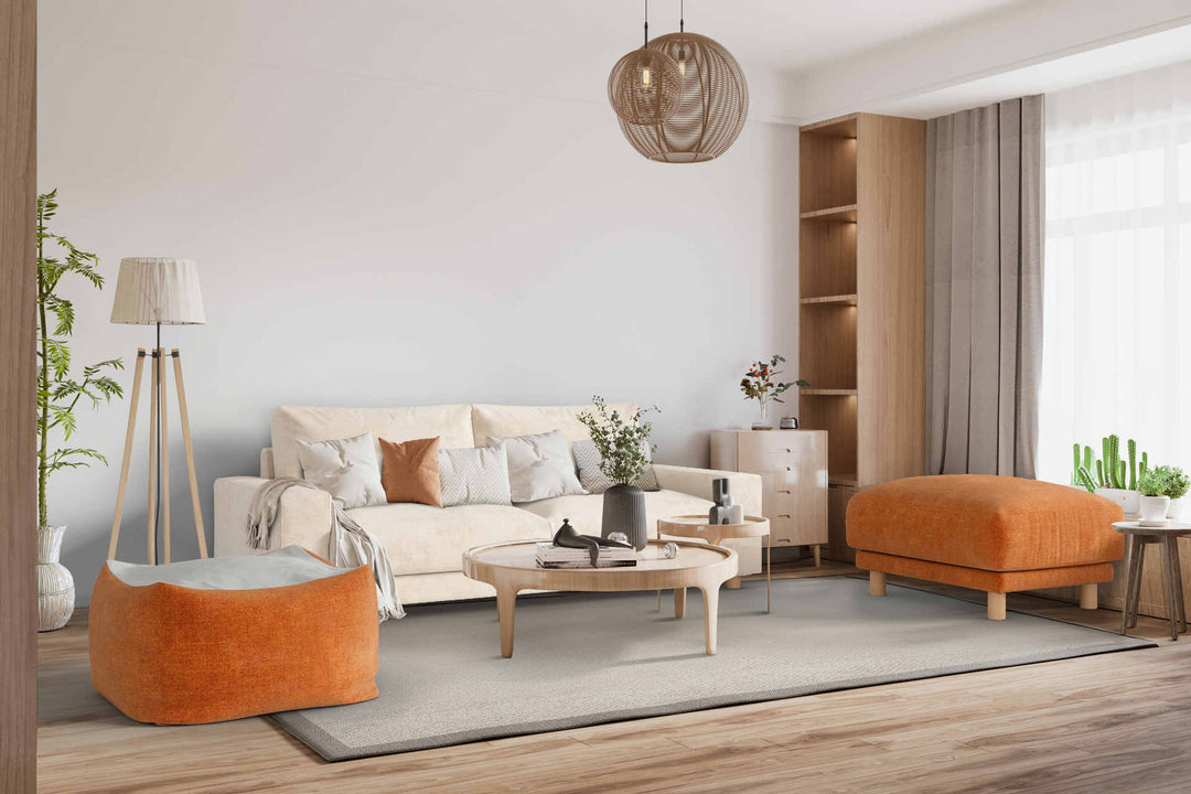 Japandi living room with Muji Wide Arm sofa in Comfort Chenille Burnt Orange and Performance Weave Cream slipcover