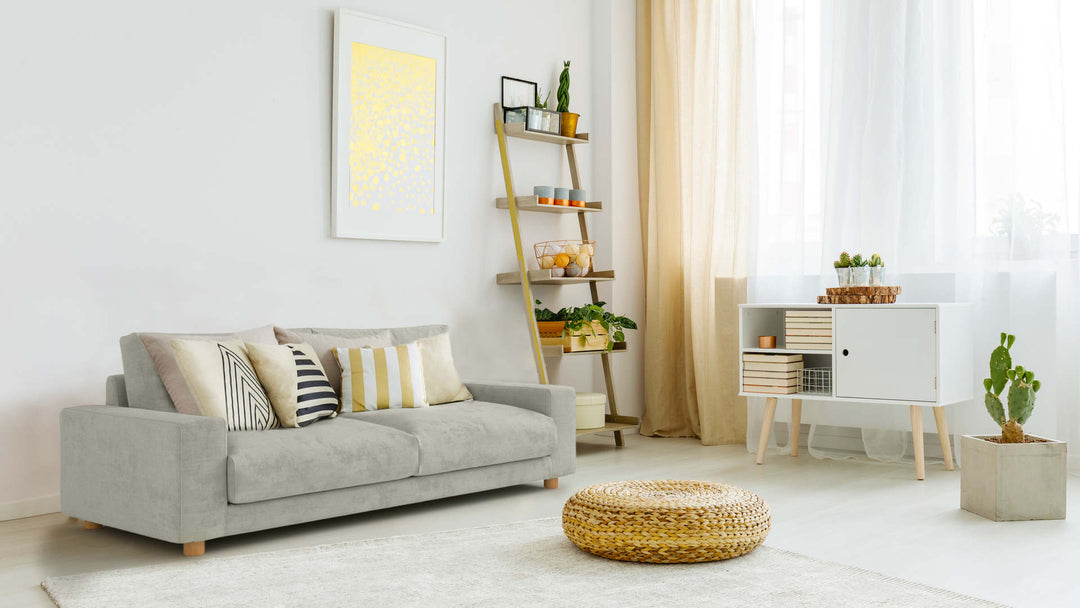 Bohemian living room with Muji Wide Arm sofa in Performance Weave Stone fabric slipcover