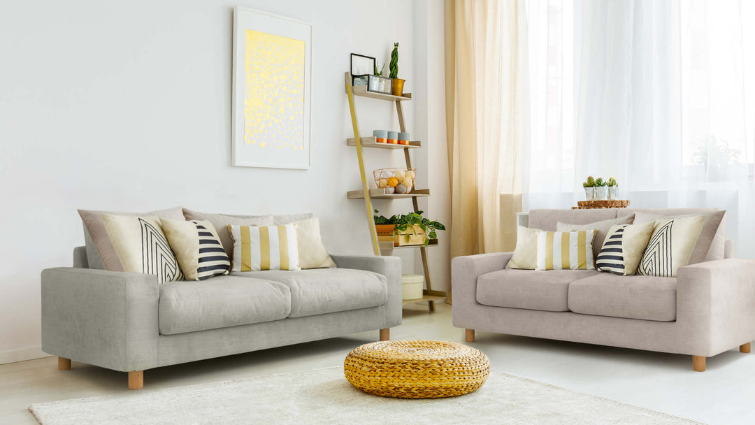 Bohemian living room with Muji Wide Arm sofa in Performance Weave Stone and Performance Weave Cream slipcover
