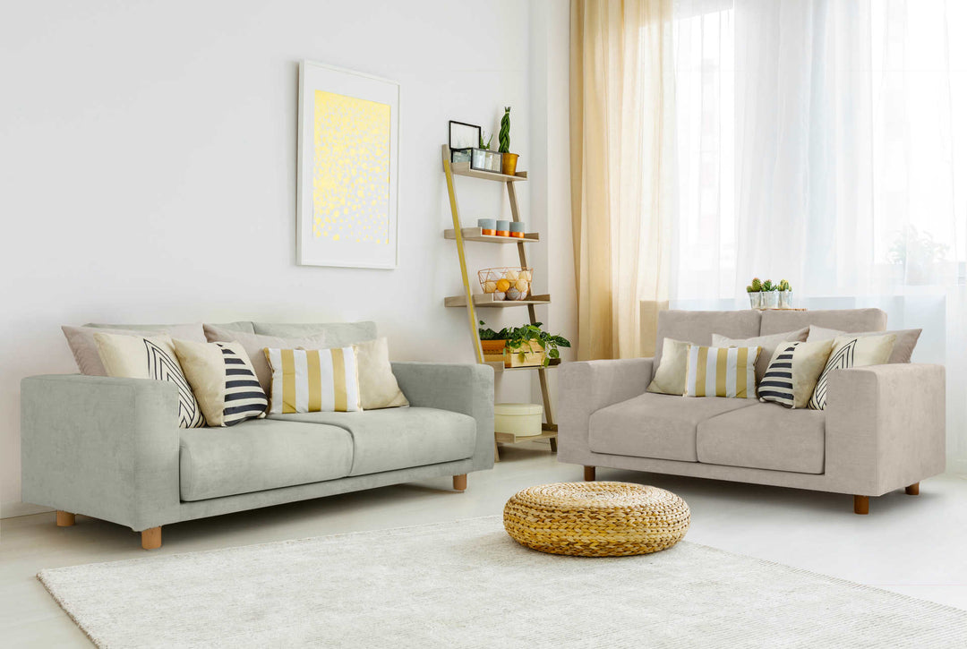 Bohemian living room with Muji Wide Arm sofa in Performance Weave Stone and Performance Weave Cream slipcover
