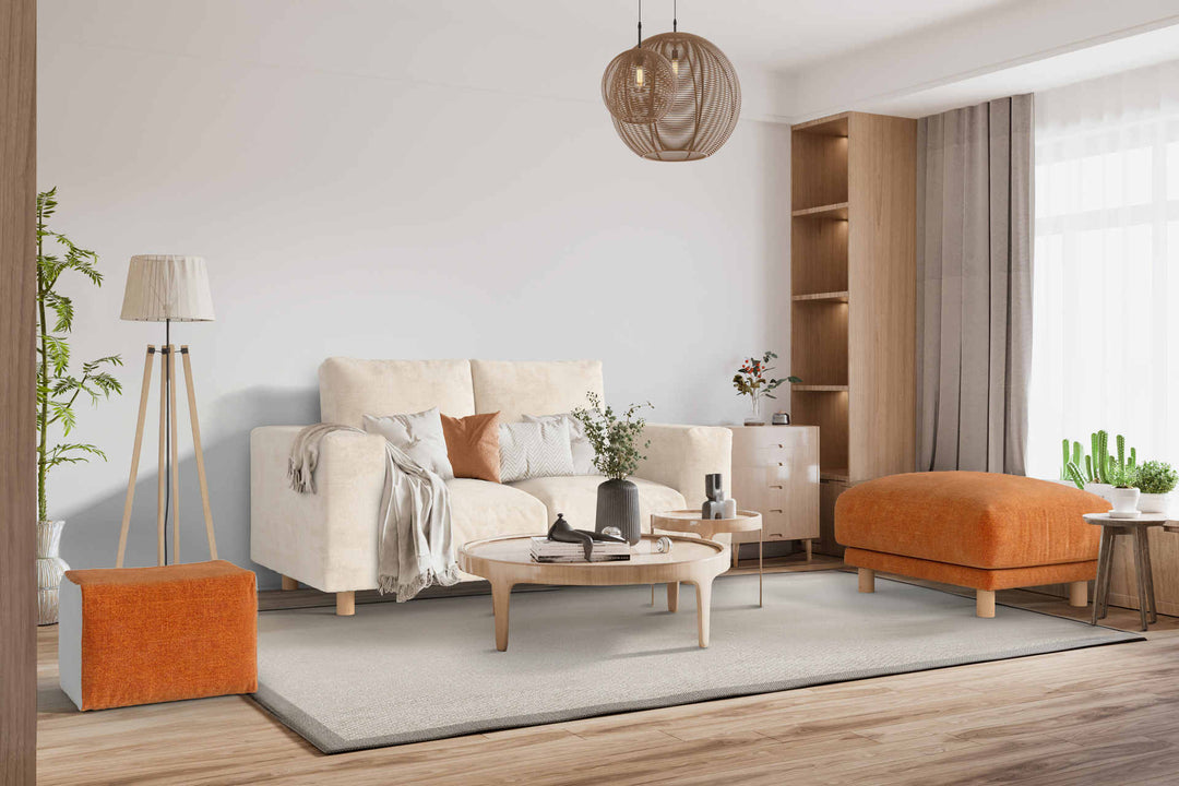 Japandi living room with Muji Wide Arm sofa in Comfort Chenille Burnt Orange and Performance Weave Cream slipcover