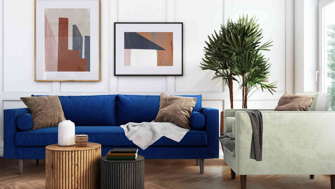 Modern Victorian living room with Article Sven sofa in Classic Velvet Cobalt and Performance Weave Stone slipcover